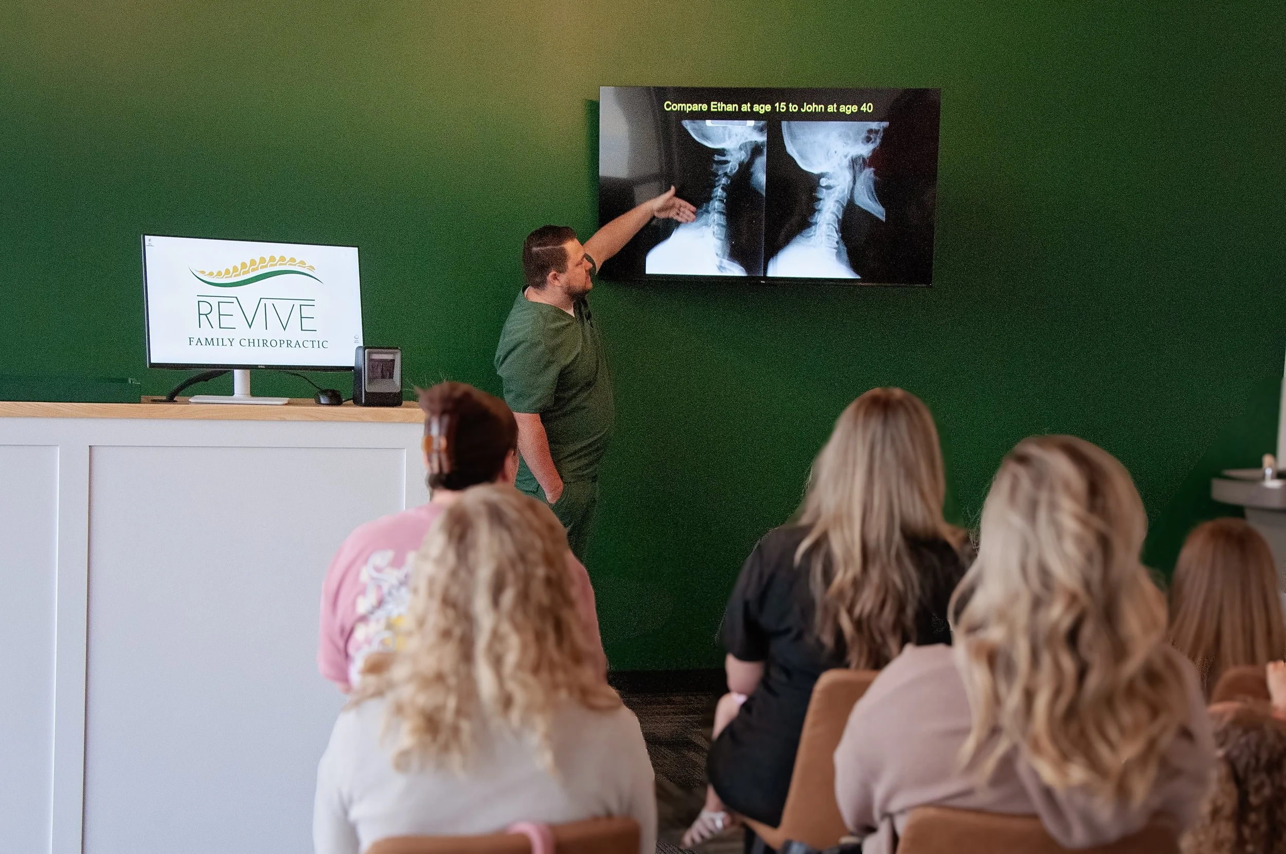 Dr. Jake Edwards giving a community presentation on chiropractic care